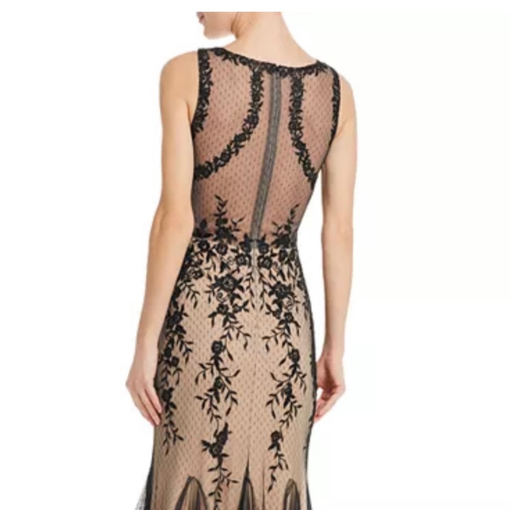 New used for an hour . 100% exclusive bloomingdales size 2!